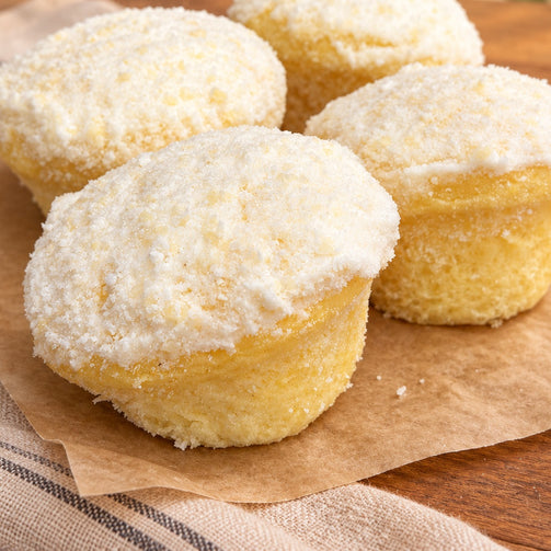 Classic Parmesan ensaymadas from Max & Lucy's, topped with butter, sugar, and cheese