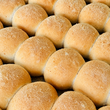 Fresh plain Filipino pandesal rolls with lightly golden crumb-dusted tops